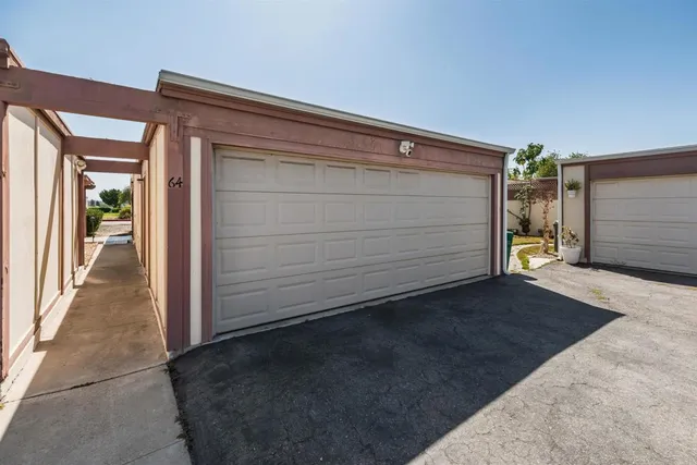 a view of front door and a garage