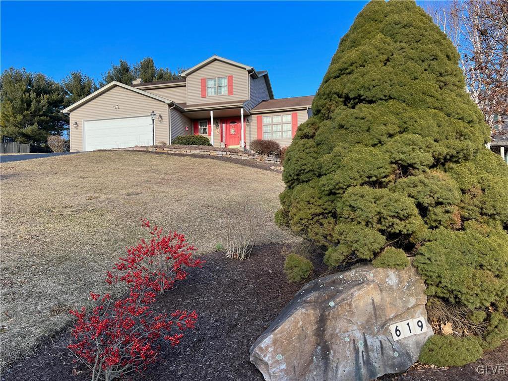 619 Stoney Run Road Pottsville, PA 17901 - Photo 2 of 15 a front view of a house with a yard