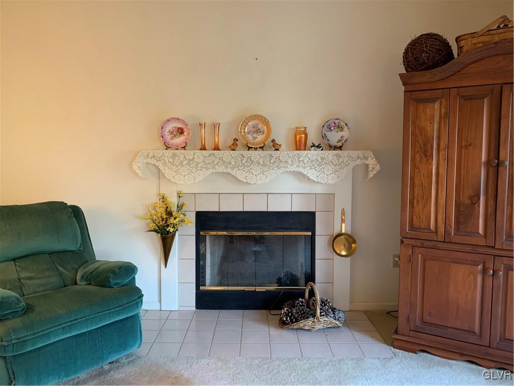 619 Stoney Run Road Pottsville, PA 17901 - Photo 9 of 15 a living room with furniture and a fireplace