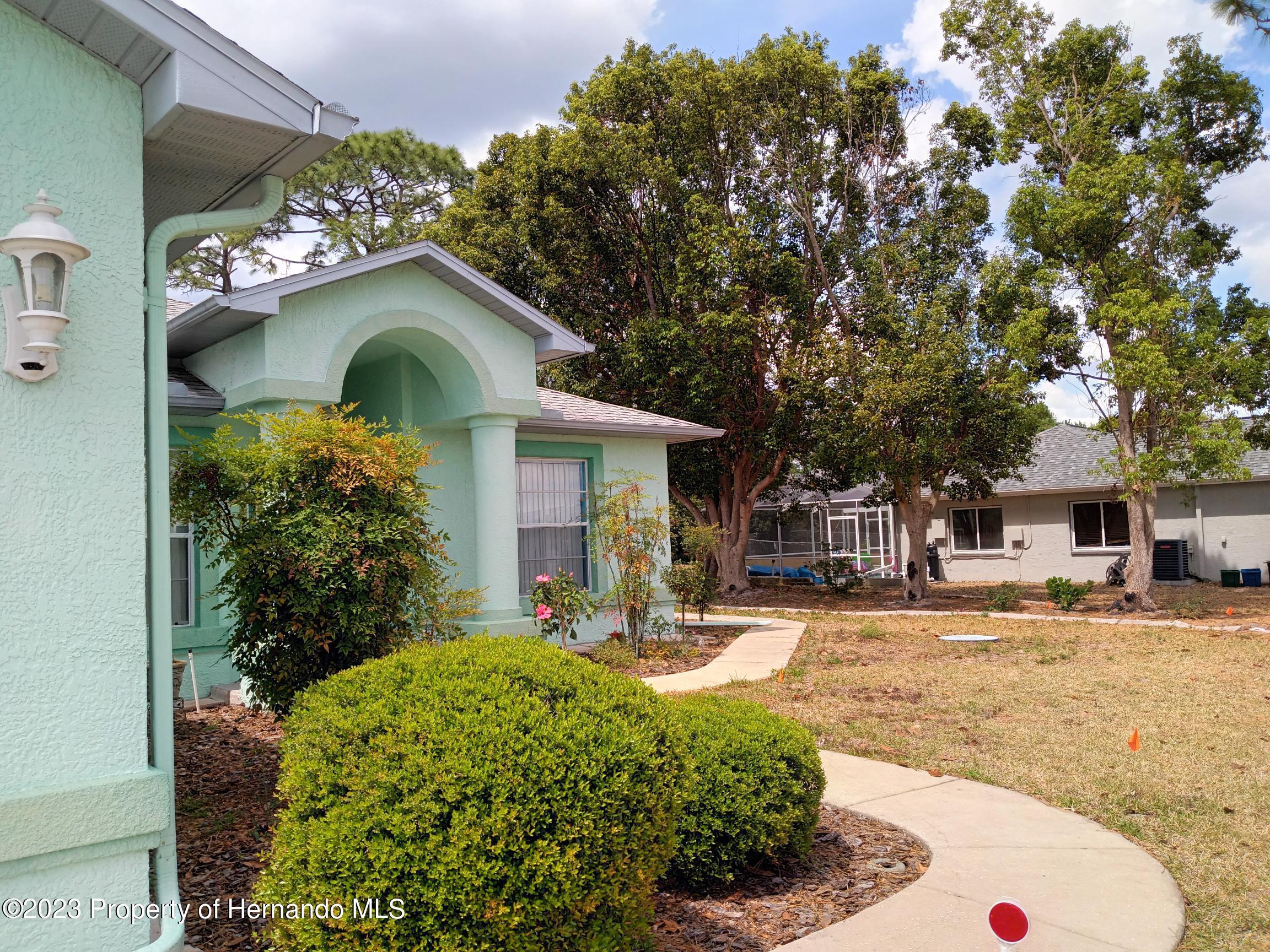8513 Beach Road Spring Hill, FL 34606 - Photo 3 of 43