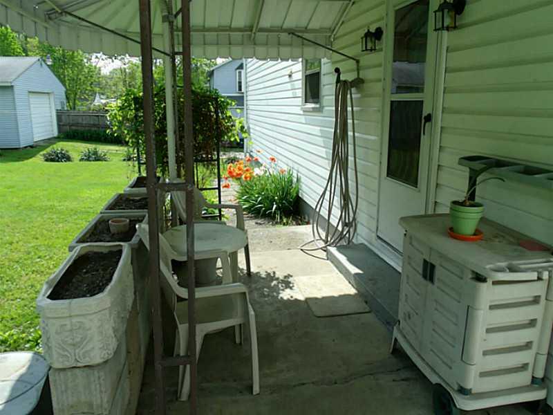 342 Oak Road Gibsonia, PA 15044 - Photo 18 of 22 Patio/Deck. COVERED REAR PORCH