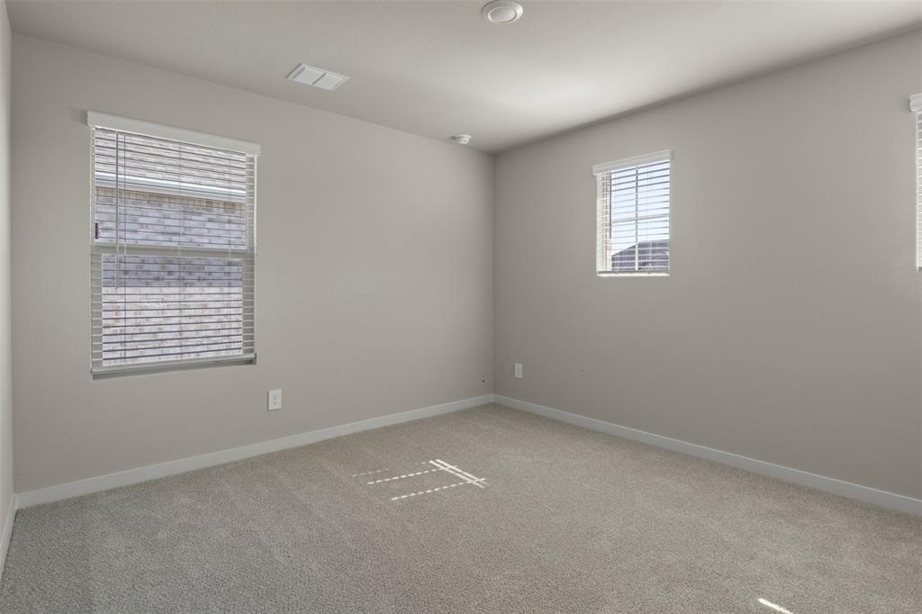 2220 Currents Road Princeton, TX 75407 - Photo 17 of 31 Recessed ceiling lighting, light-toned walls, and neutral carpeting