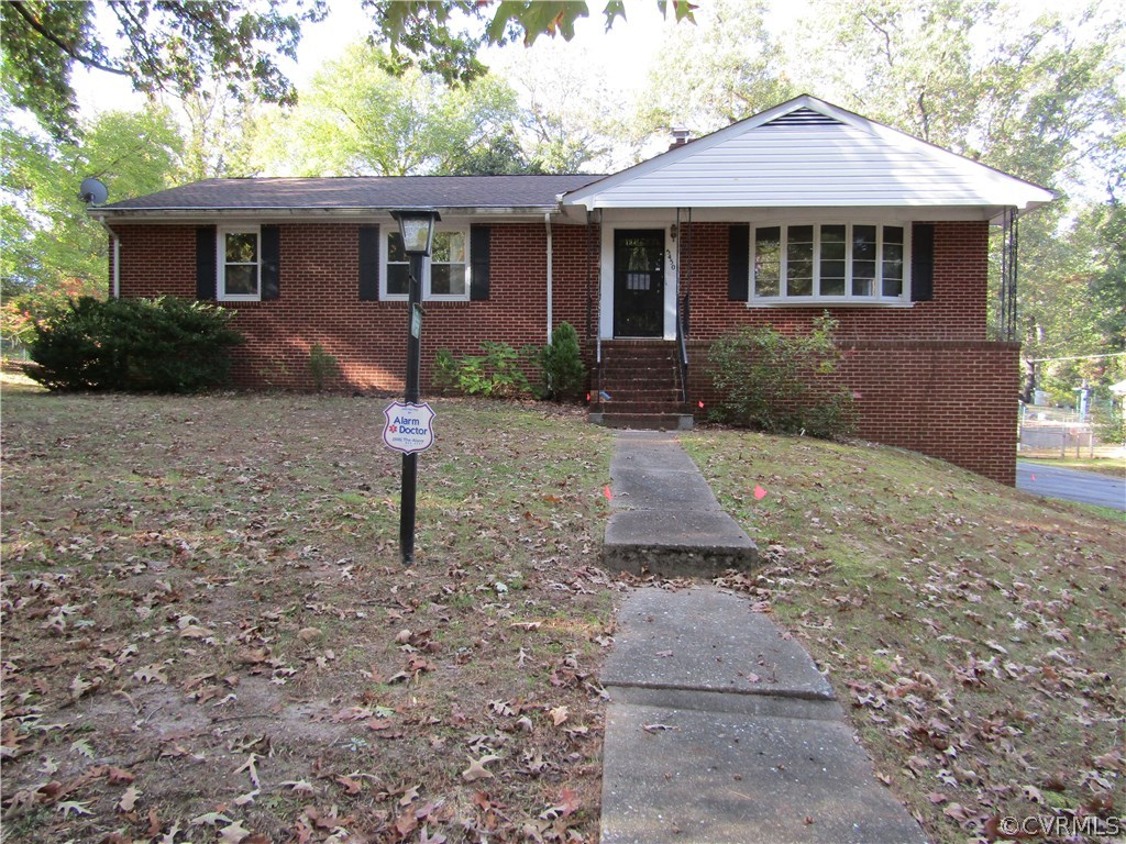 5450 Catterick Road North Chesterfield, VA 23234 - Photo 1 of 29 a front view of a house with yard and trees