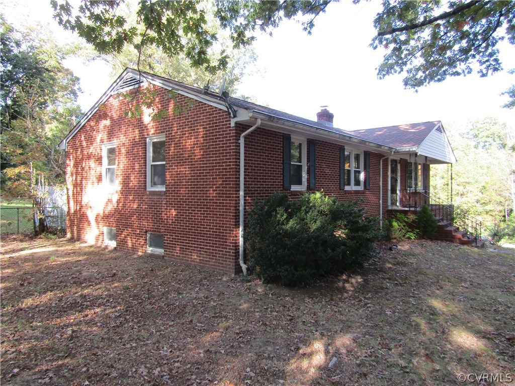 5450 Catterick Road North Chesterfield, VA 23234 - Photo 2 of 29 a view of a house with a yard
