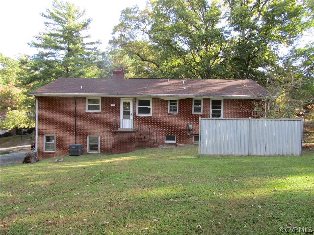 5450 Catterick Road North Chesterfield, VA 23234 - Photo 4 of 29 a front view of house with yard and trees all around