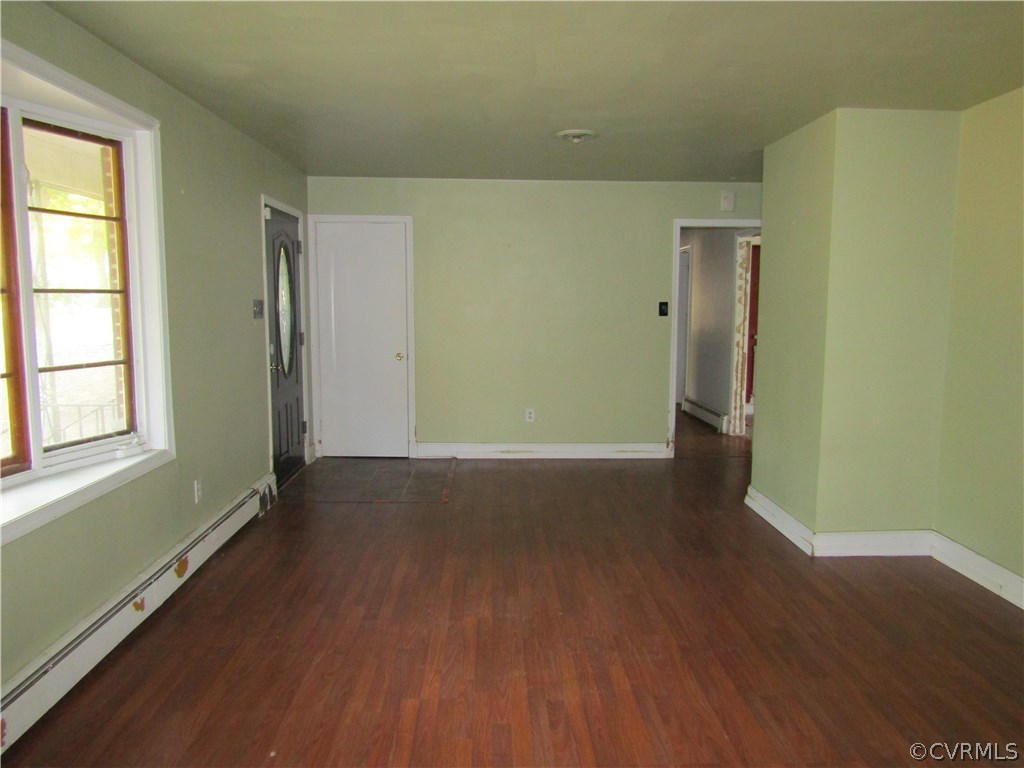 5450 Catterick Road North Chesterfield, VA 23234 - Photo 9 of 29 an empty room with wooden floor and windows