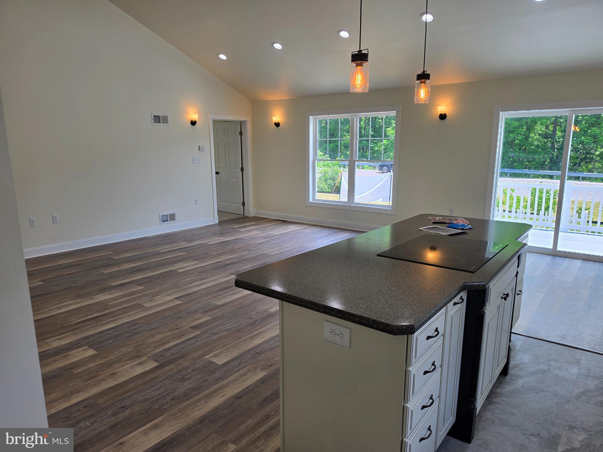 13514 Old Cresaptown Road Southwest Lavale, MD 21502 - Photo 11 of 25 a kitchen with stainless steel appliances granite countertop a sink a stove and a wooden floors