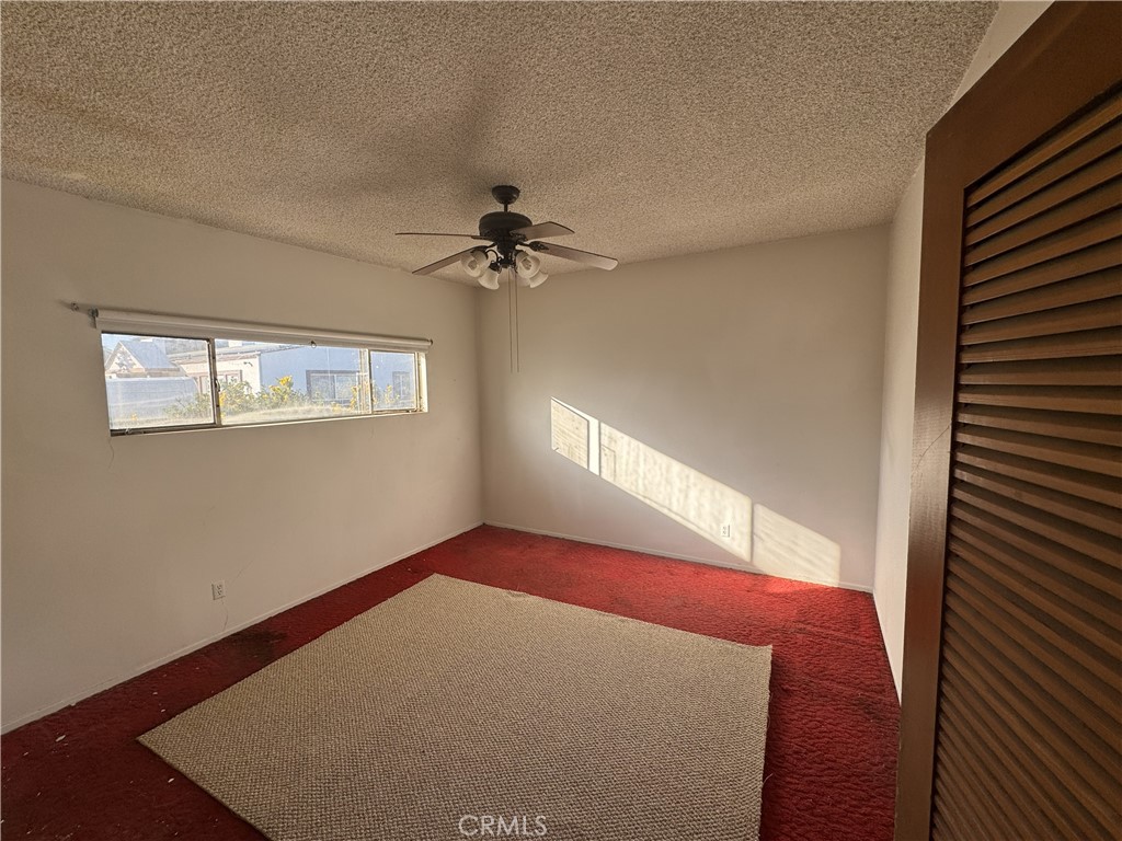 17545 Community Street Northridge, CA 91325 - Photo 15 of 22 a view of an empty room with a window