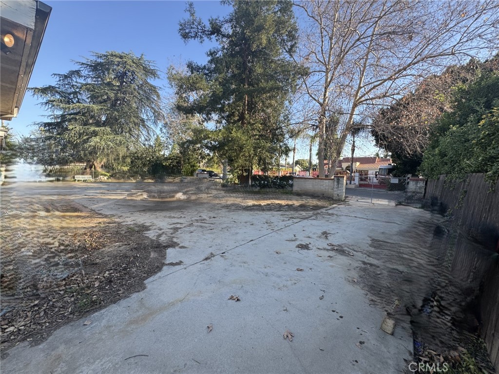 17545 Community Street Northridge, CA 91325 - Photo 22 of 22 a view of dirt yard with a large tree