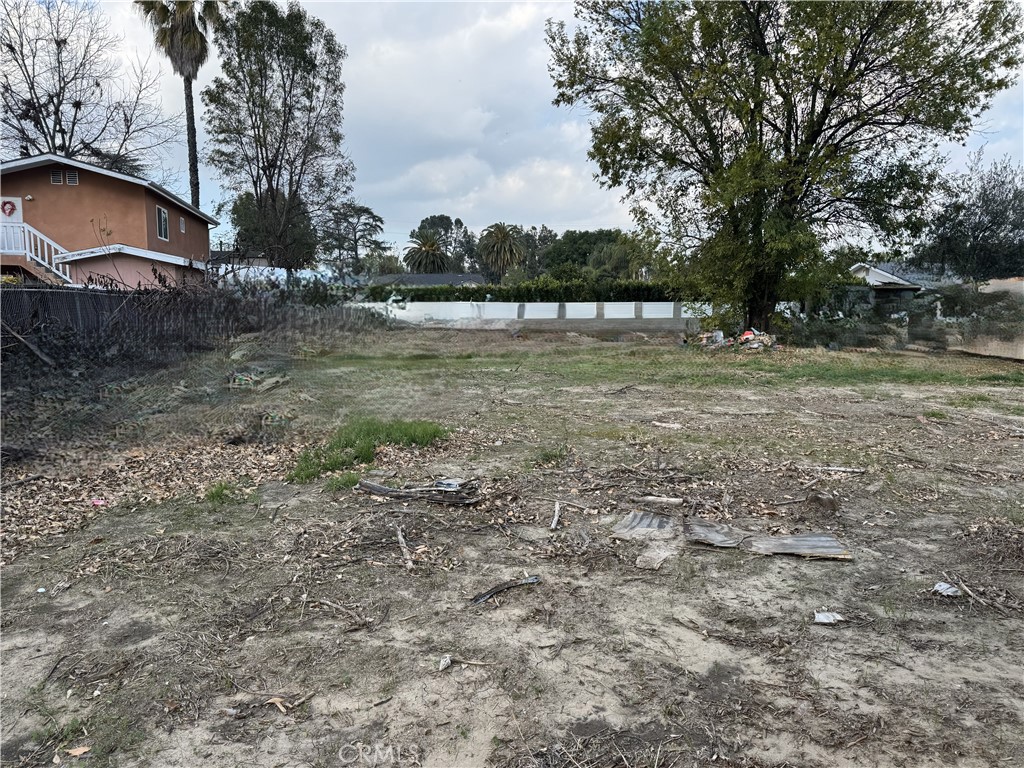 17545 Community Street Northridge, CA 91325 - Photo 3 of 22 a view of a yard with a fountain