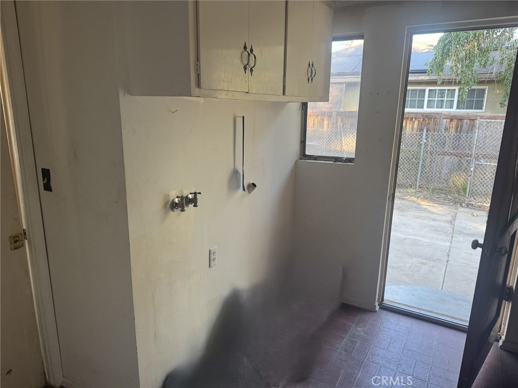 17545 Community Street Northridge, CA 91325 - Photo 7 of 22 a view of a hallway with windows