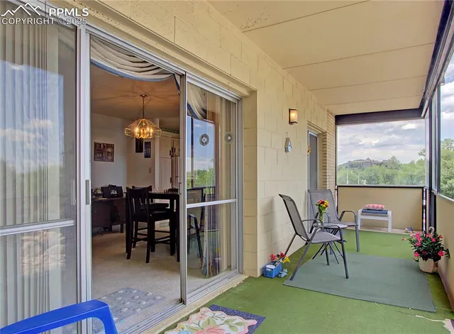 a view of living room kitchen and dining area