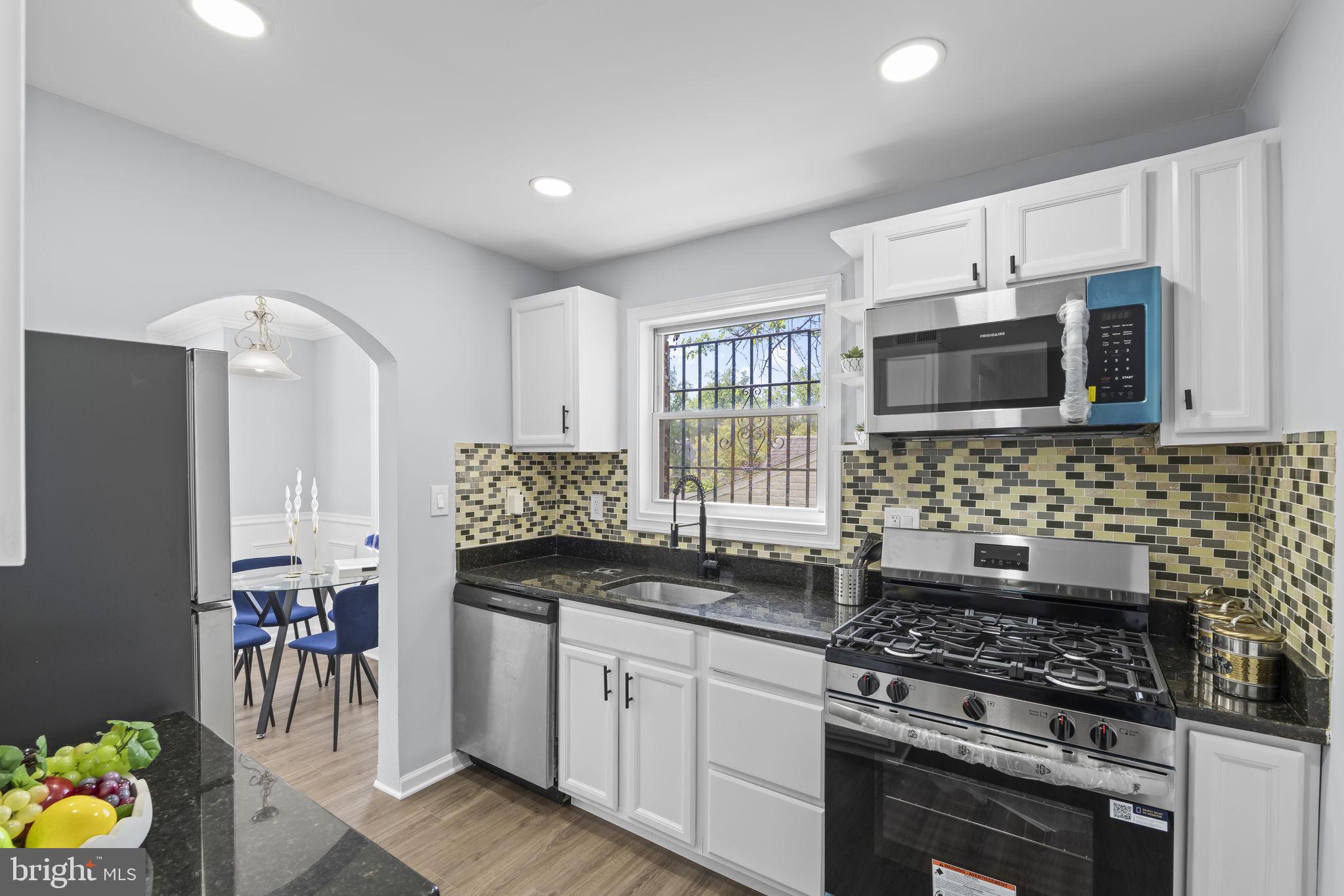 5414 Taussig Road Bladensburg, MD 20710 - Photo 11 of 26 Modern kitchen with stylish accents.