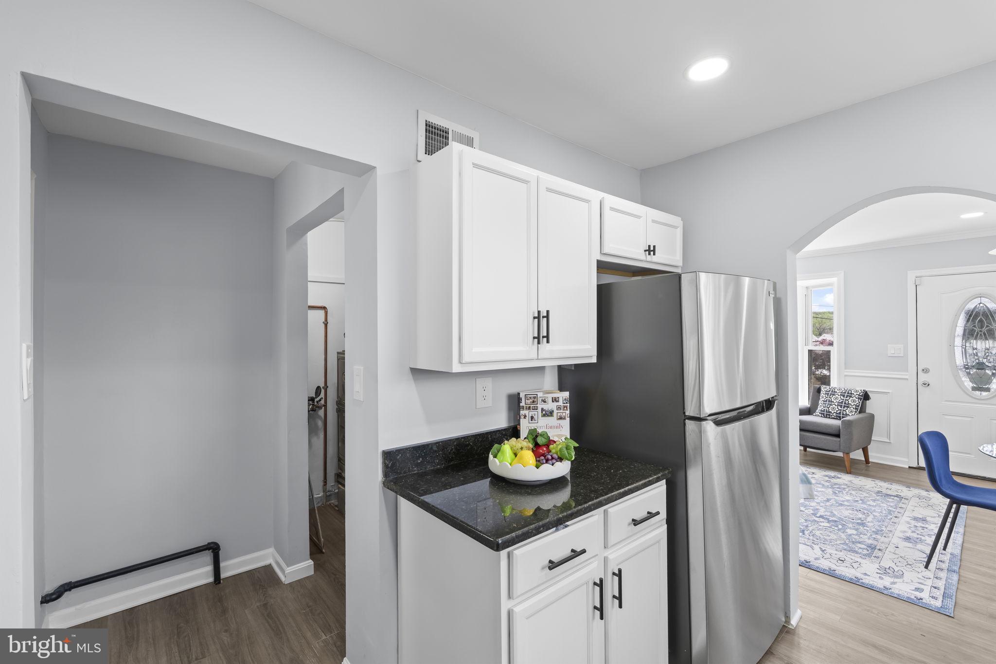 5414 Taussig Road Bladensburg, MD 20710 - Photo 12 of 26 Modern kitchen with sleek finishes.