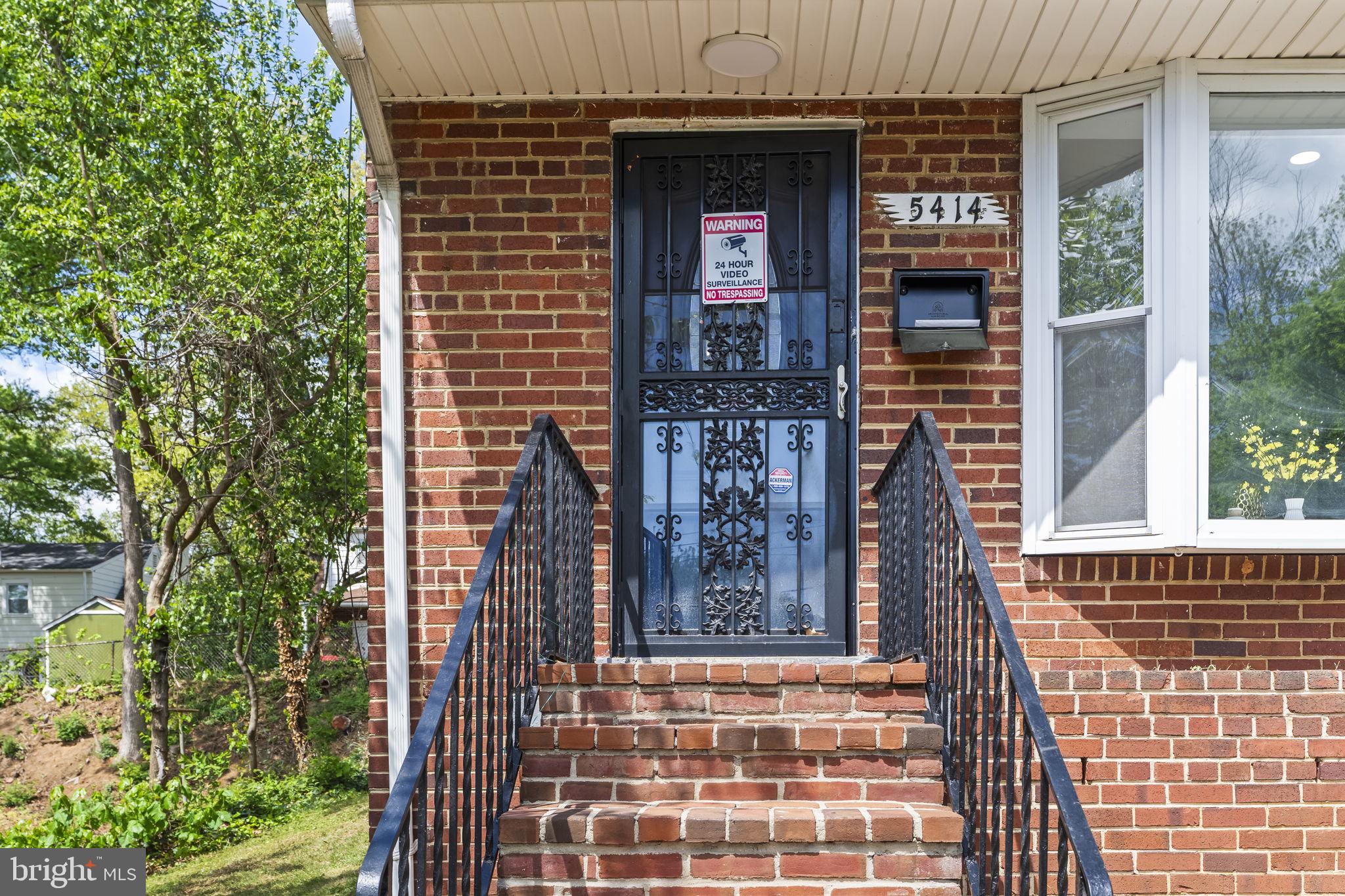 5414 Taussig Road Bladensburg, MD 20710 - Photo 5 of 26 Charming brick entrance with security.