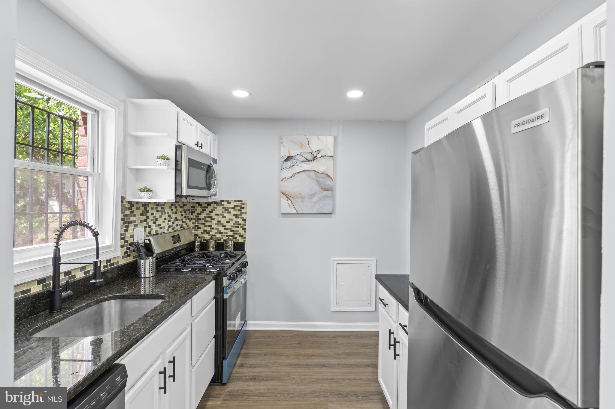 5414 Taussig Road Bladensburg, MD 20710 - Photo 10 of 26 Modern kitchen with sleek finishes.