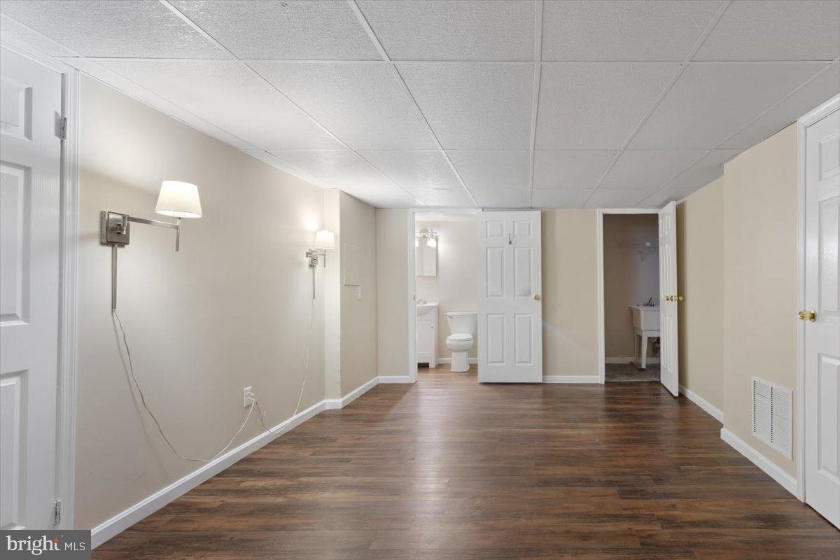 1929 East Beech Road Sterling, VA 20164 - Photo 44 of 56 Den with full bathroom, LVP flooring