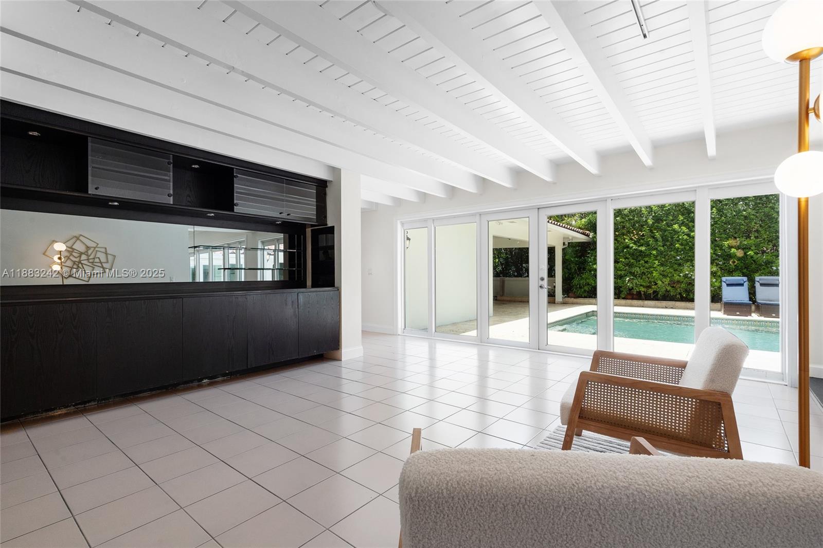5810 Maggiore Street, Unit 5810 Coral Gables, FL 33146 - Photo 19 of 37 a living room with furniture