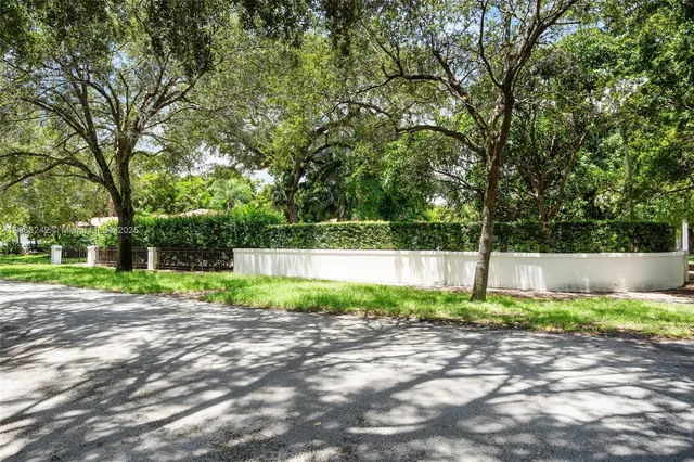 a view of backyard with green space