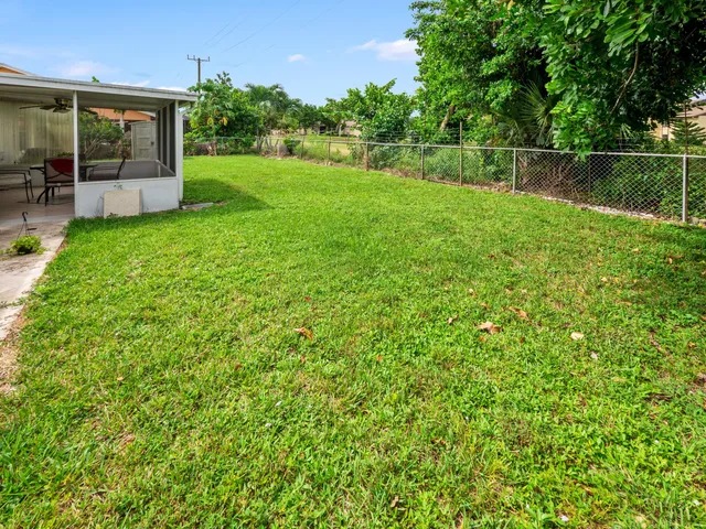 a view of backyard with green space