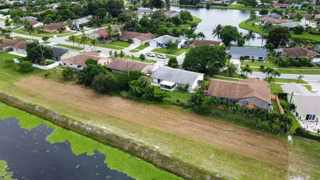 a view of a garden with a lake view