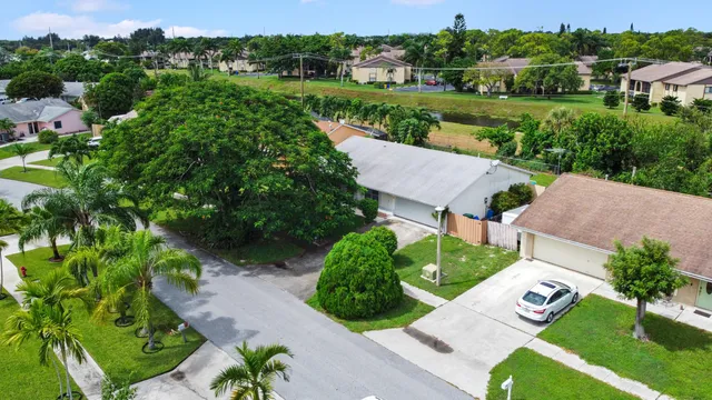 a view of a garden with plants and lake view