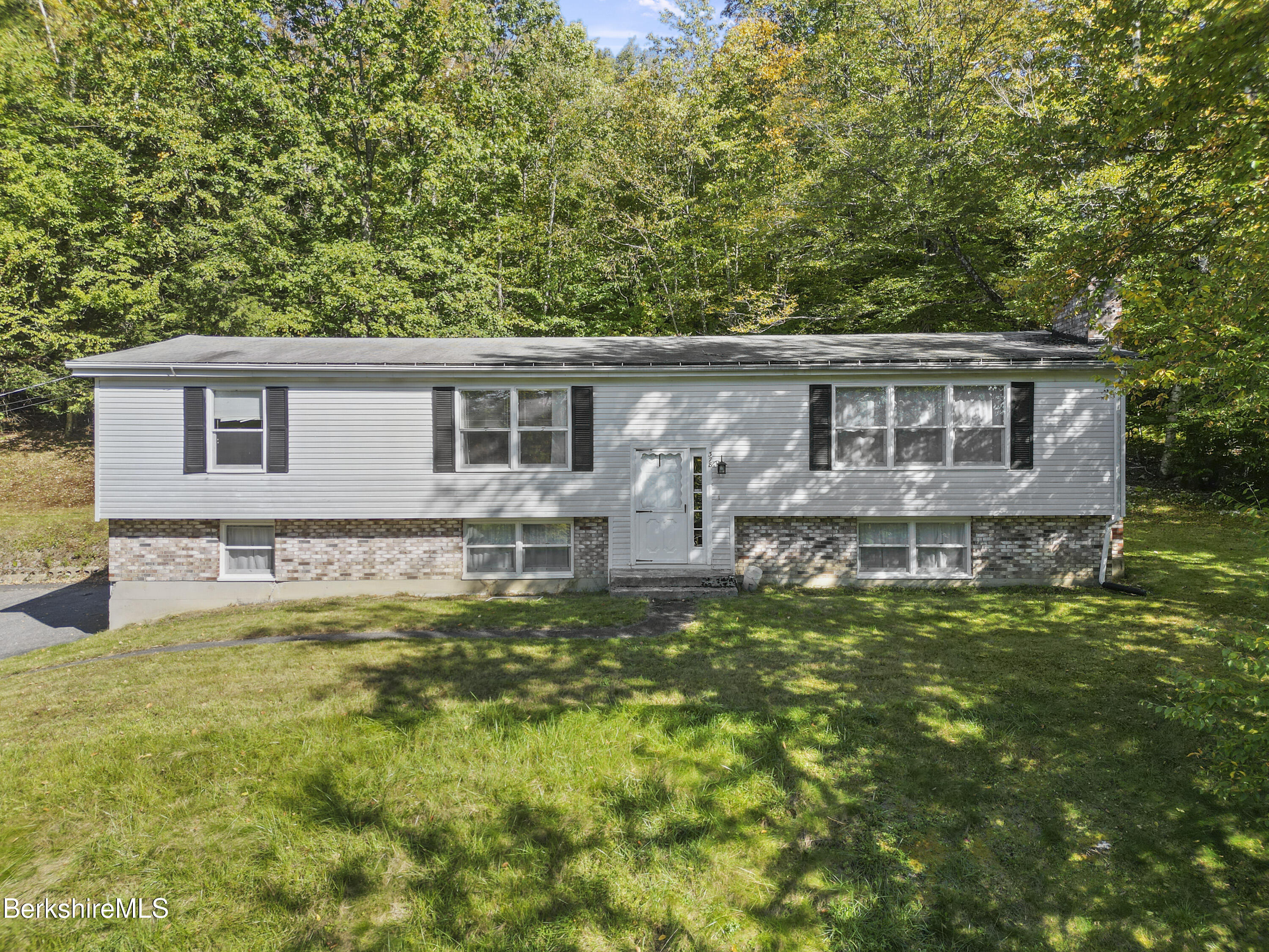 378 E Road Clarksburg, MA 01247 - Photo 1 of 36 a front view of house with yard and swimming pool