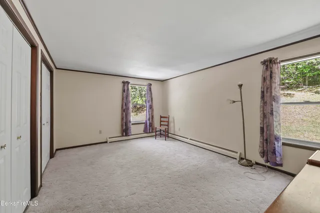 an empty room with windows