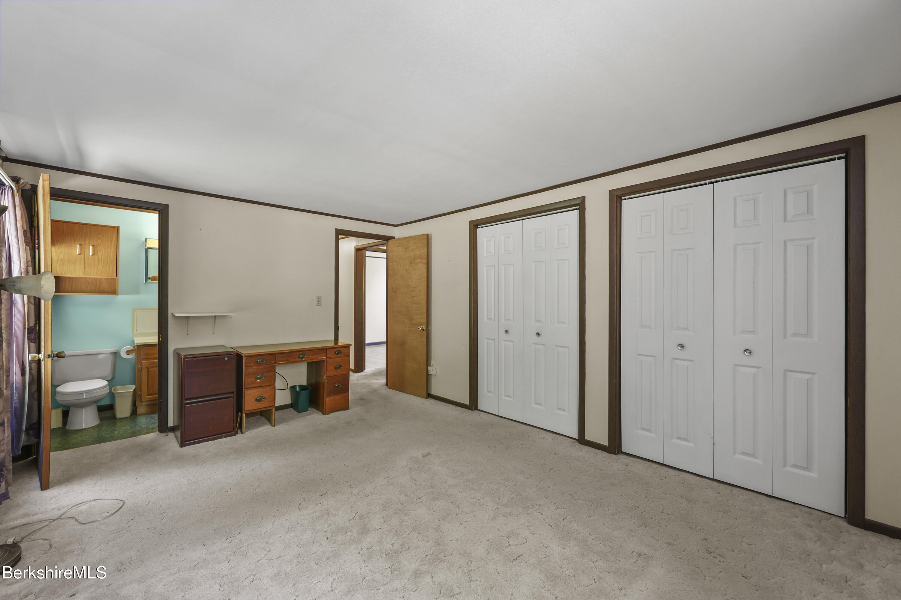 378 E Road Clarksburg, MA 01247 - Photo 19 of 36 a view of empty room with furniture and a fireplace
