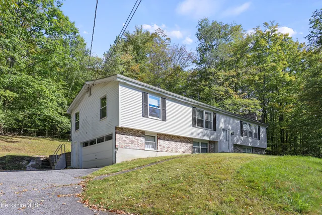 a house view with a outdoor space