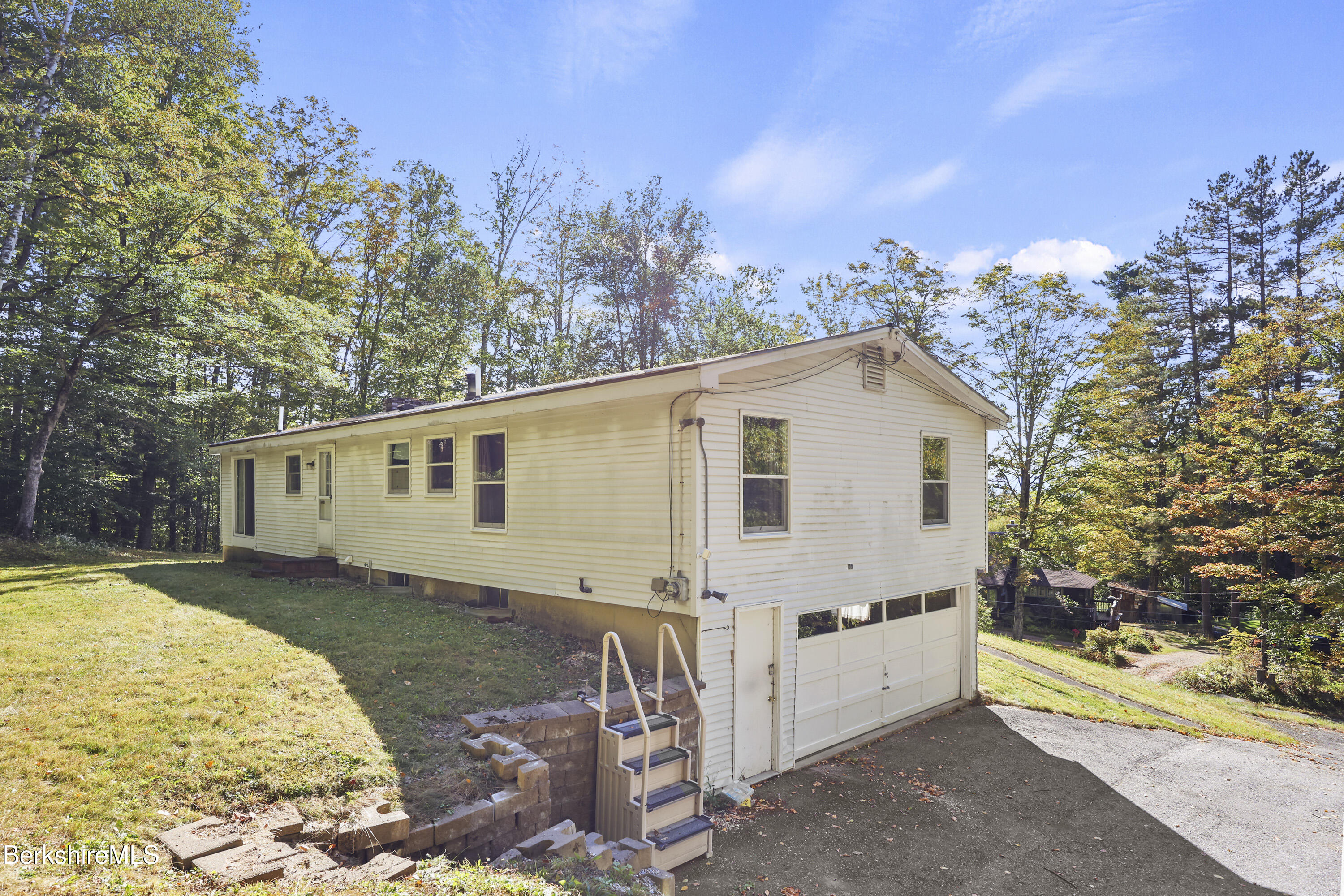 378 E Road Clarksburg, MA 01247 - Photo 29 of 36 a view of a house with a yard