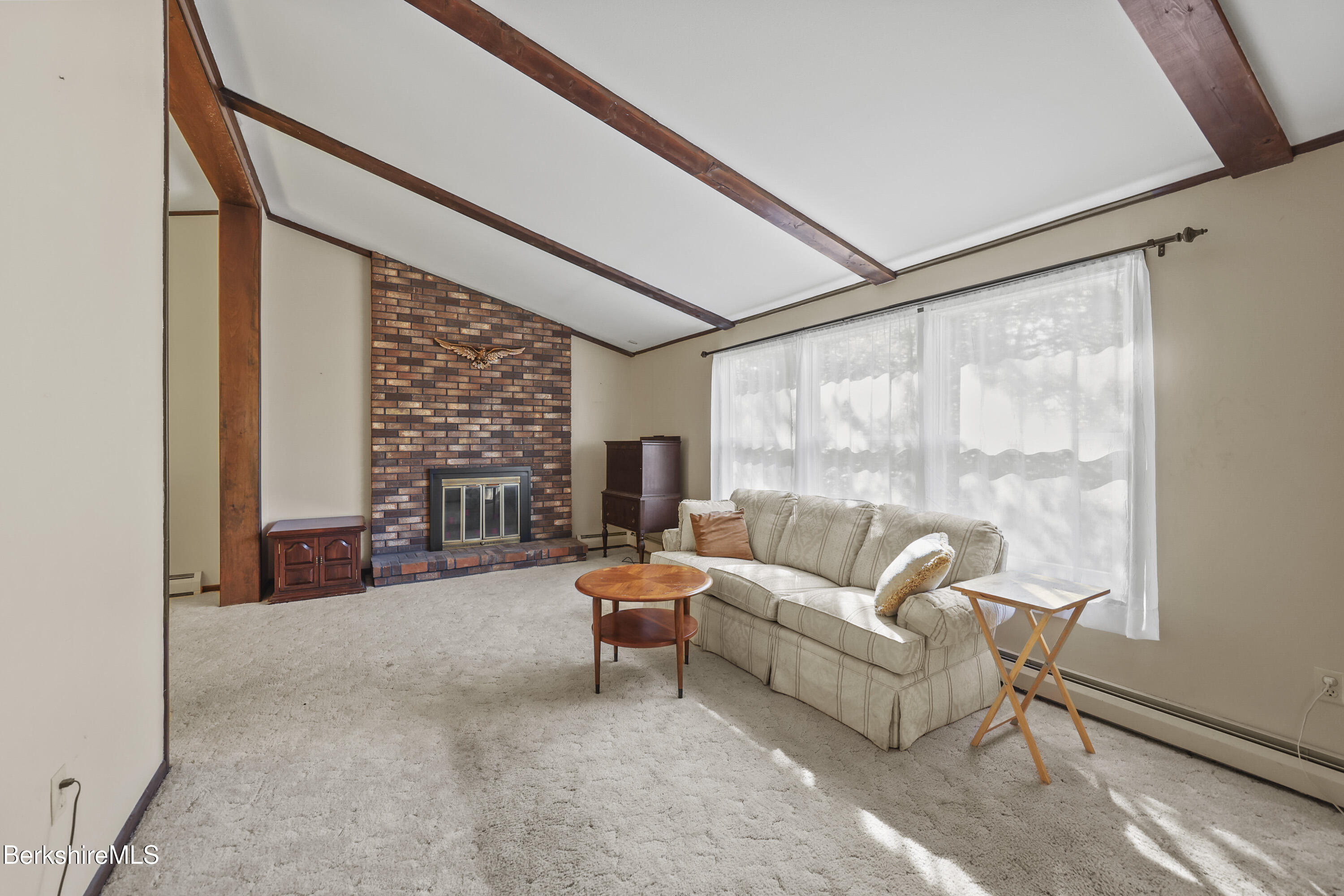 378 E Road Clarksburg, MA 01247 - Photo 3 of 36 a living room with furniture and a large window