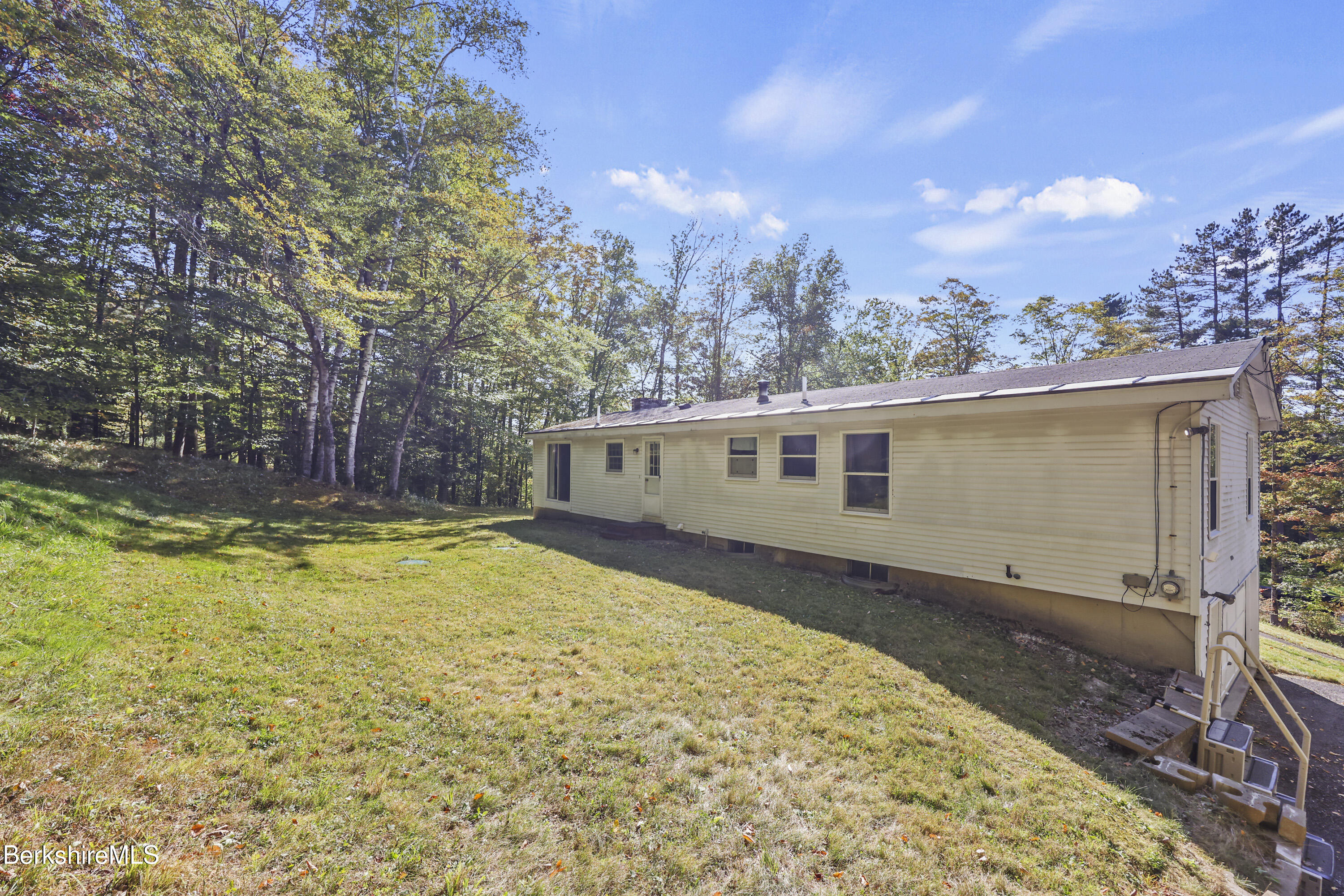 378 E Road Clarksburg, MA 01247 - Photo 32 of 36 a view of a house with a yard