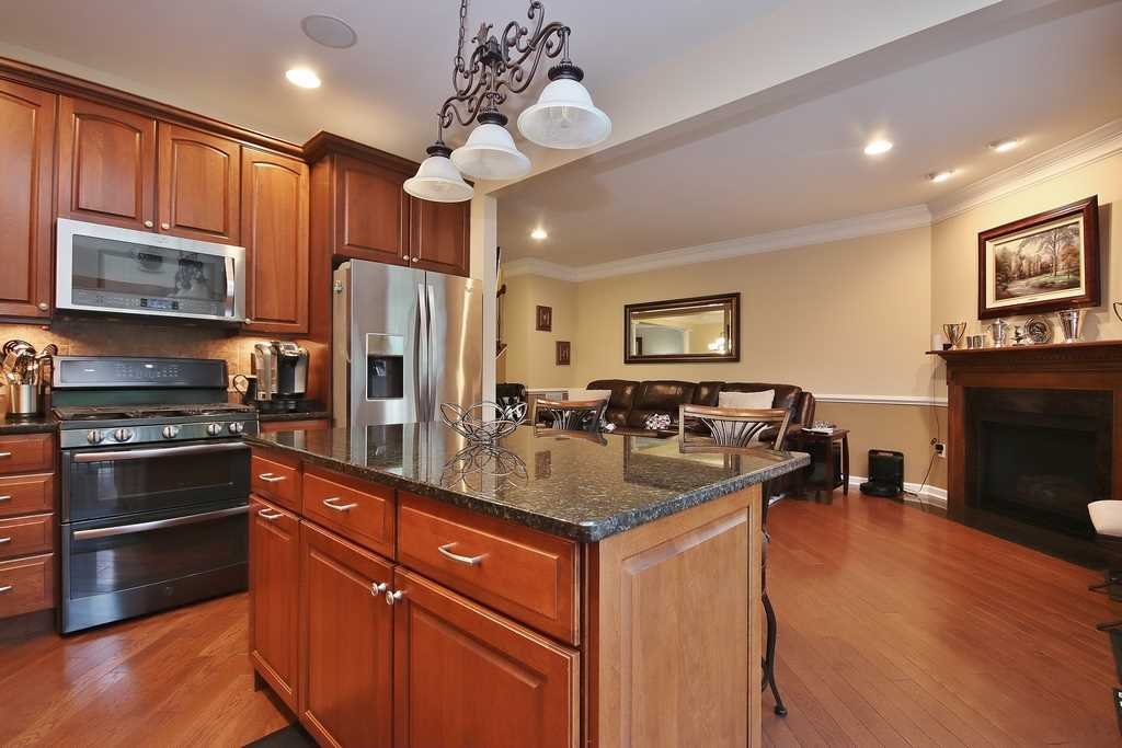 1118 Cold Spring Road Fishkill, NY 12524 - Photo 15 of 34 a kitchen with stainless steel appliances granite countertop a stove refrigerator and cabinets