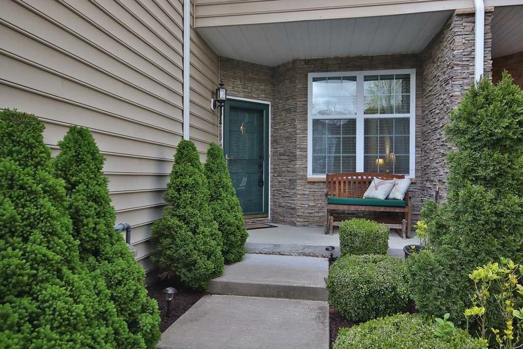 1118 Cold Spring Road Fishkill, NY 12524 - Photo 2 of 34 a backyard of a house with outdoor seating and plants