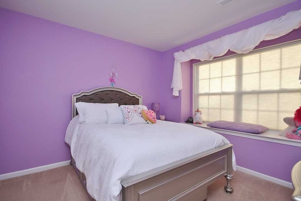 1118 Cold Spring Road Fishkill, NY 12524 - Photo 27 of 34 a bedroom with a bed and a window