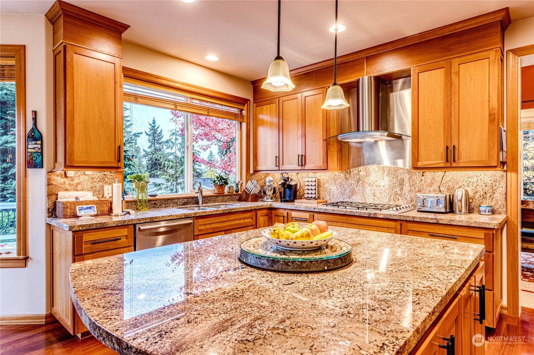 18928 108th Avenue Northeast Bothell, WA 98011 - Photo 12 of 39 a kitchen with stainless steel appliances granite countertop a sink and a counter