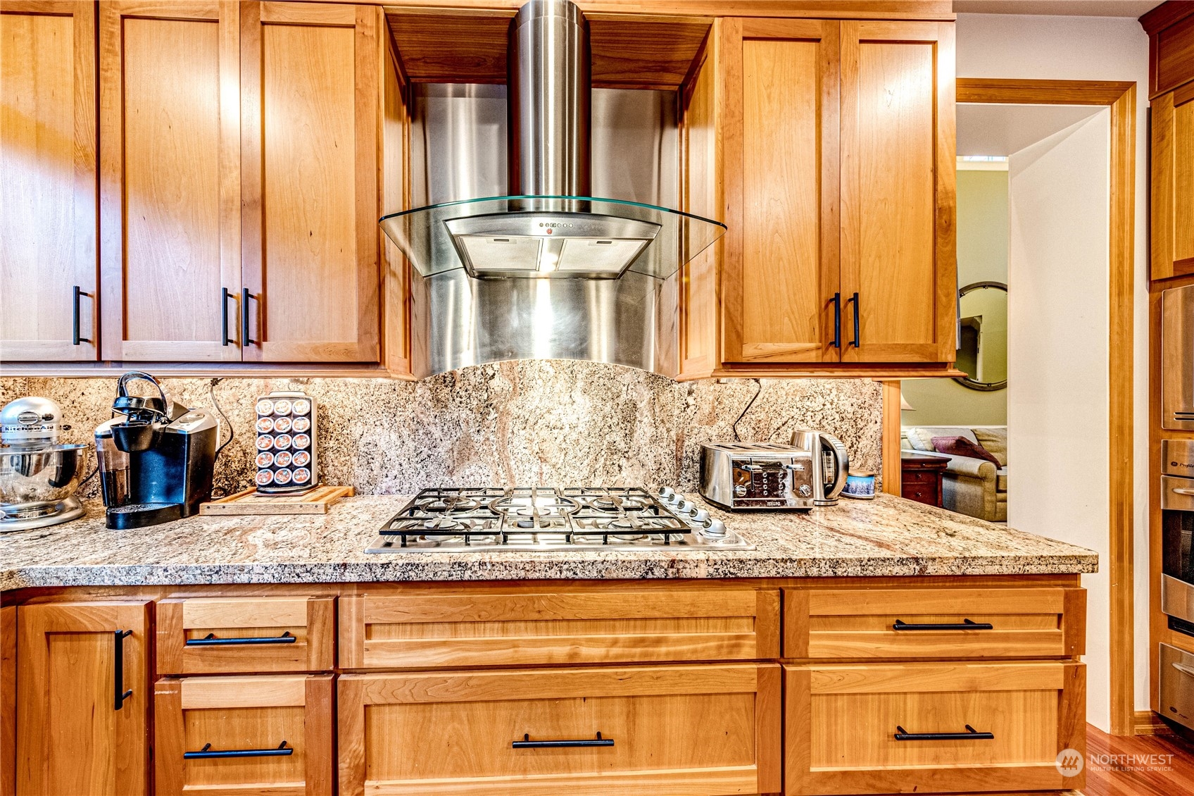 18928 108th Avenue Northeast Bothell, WA 98011 - Photo 13 of 39 a bathroom with a granite countertop sink and a mirror
