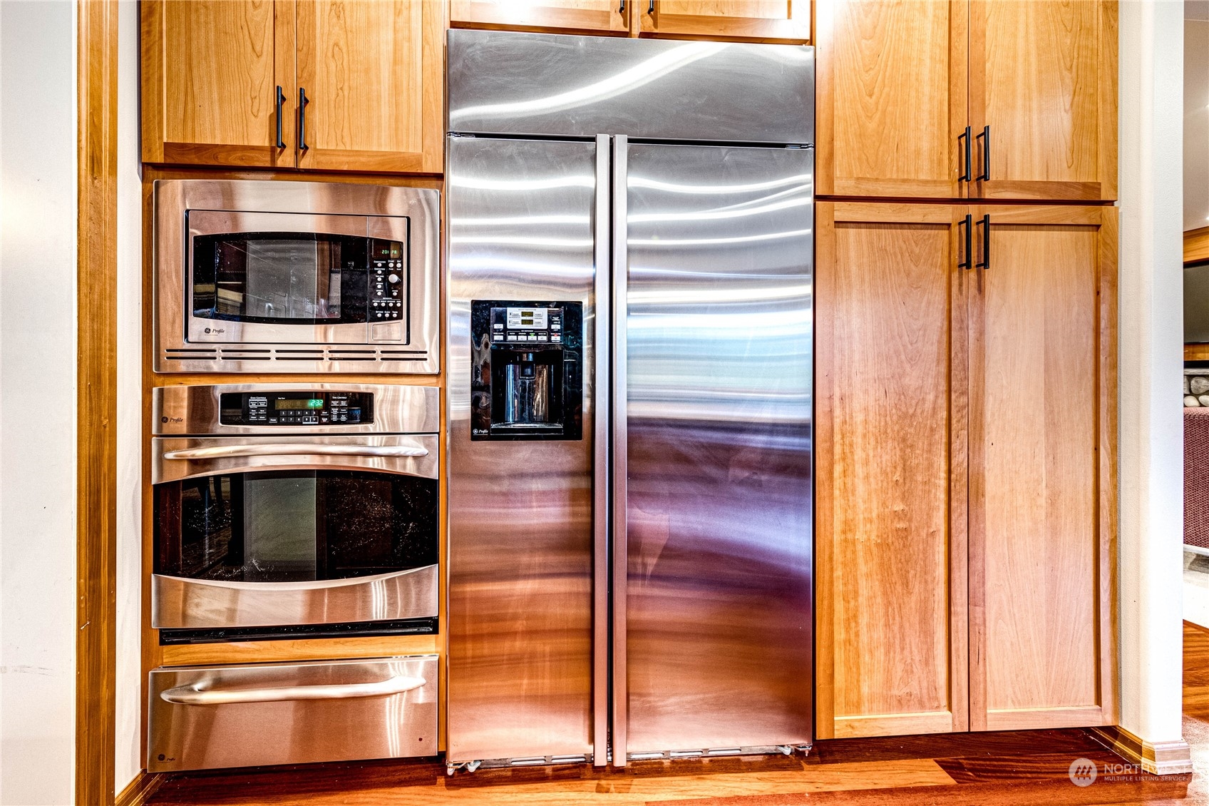 18928 108th Avenue Northeast Bothell, WA 98011 - Photo 14 of 39 a kitchen with granite countertop and stainless steel appliances