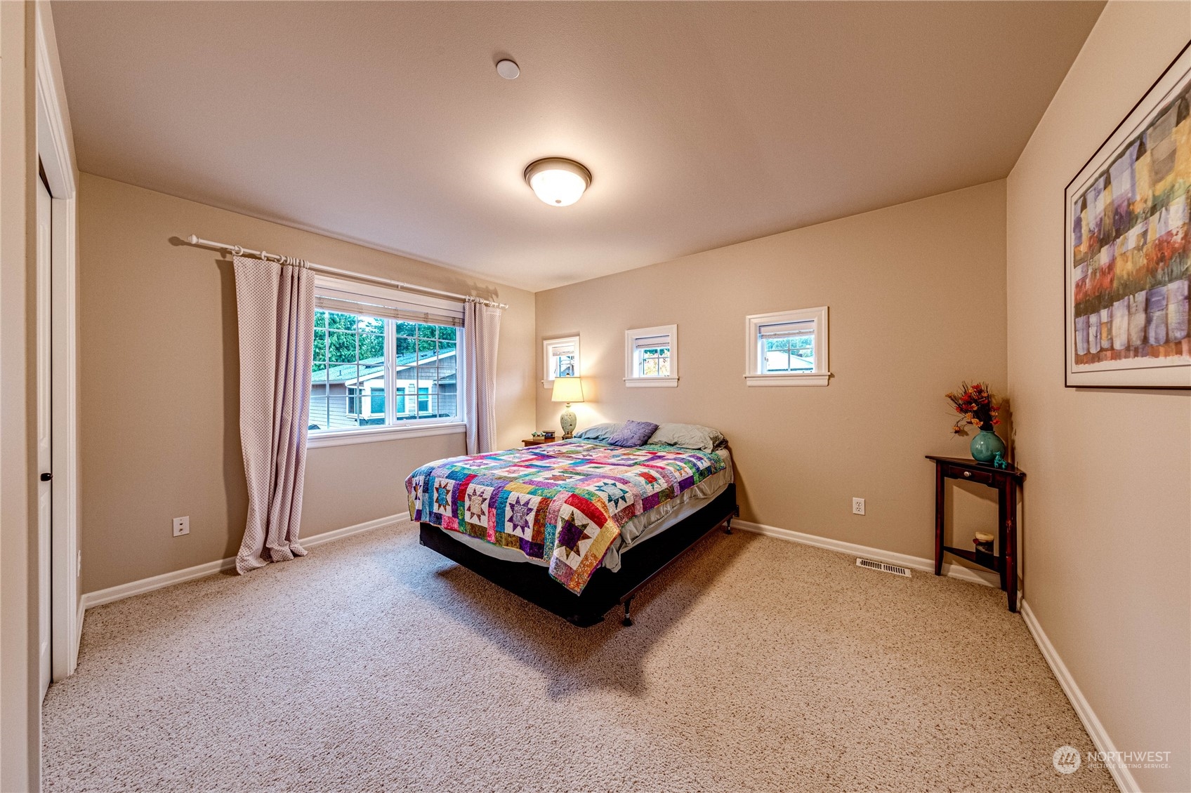 18928 108th Avenue Northeast Bothell, WA 98011 - Photo 20 of 39 a bedroom with a bed and a window