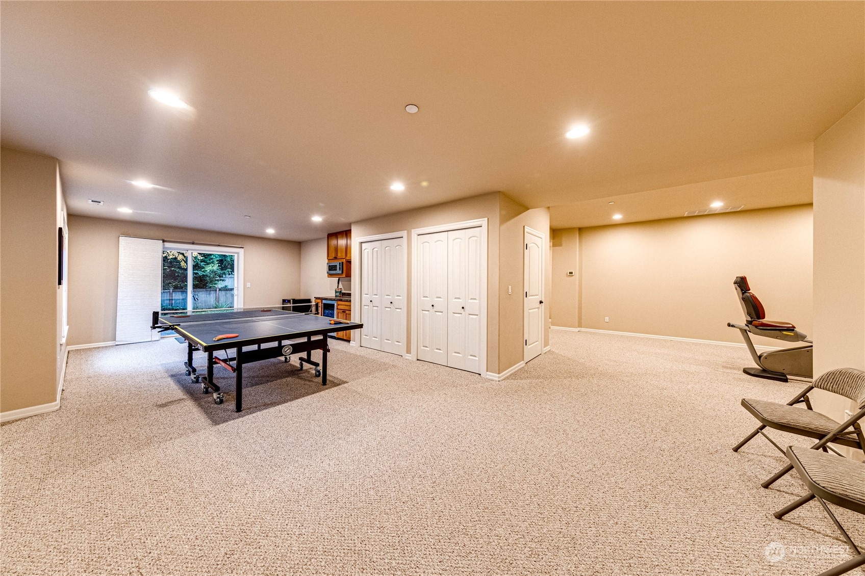 18928 108th Avenue Northeast Bothell, WA 98011 - Photo 29 of 39 a room with lots of furniture and air hockey table