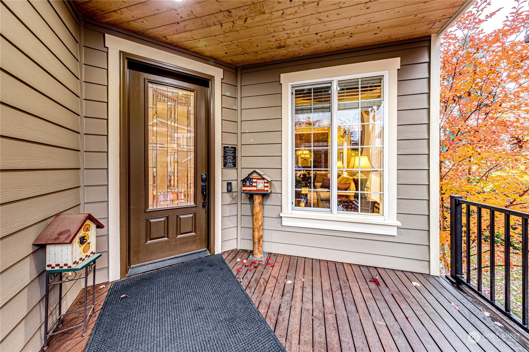 18928 108th Avenue Northeast Bothell, WA 98011 - Photo 3 of 39 a view of a porch with wooden floor and floor to ceiling window