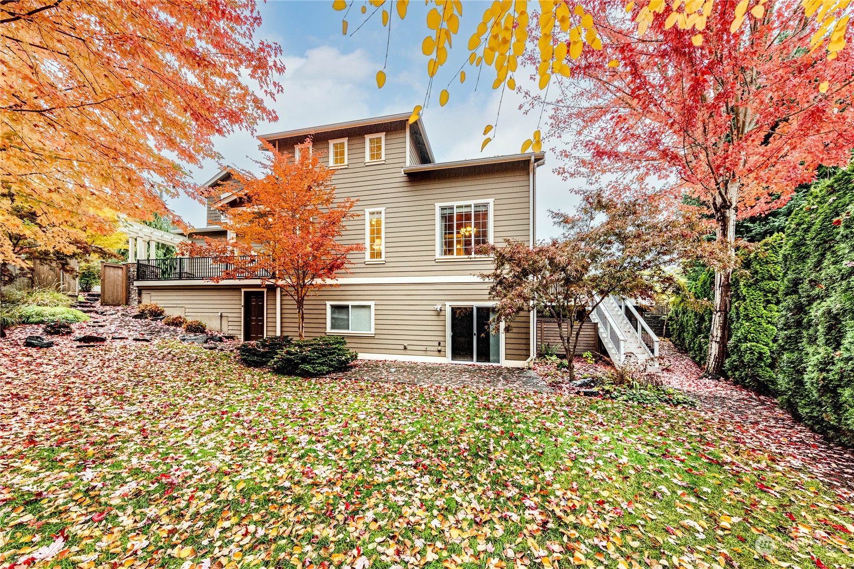 18928 108th Avenue Northeast Bothell, WA 98011 - Photo 37 of 39 a view of a house with a yard