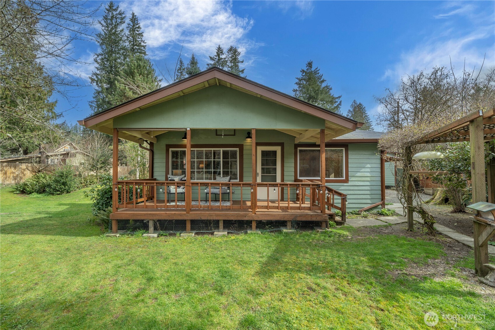 23711 Dorre Don Way Southeast Maple Valley, WA 98038 - Photo 39 of 40 a backyard of a house with yard table and chairs