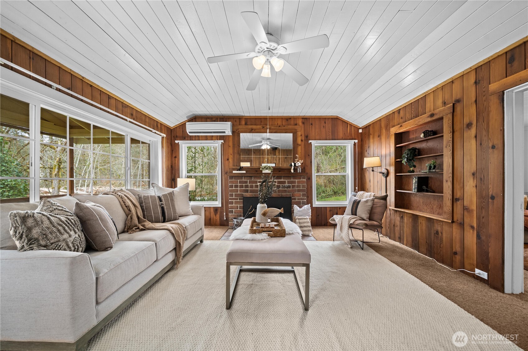 23711 Dorre Don Way Southeast Maple Valley, WA 98038 - Photo 7 of 40 a living room with furniture and large windows