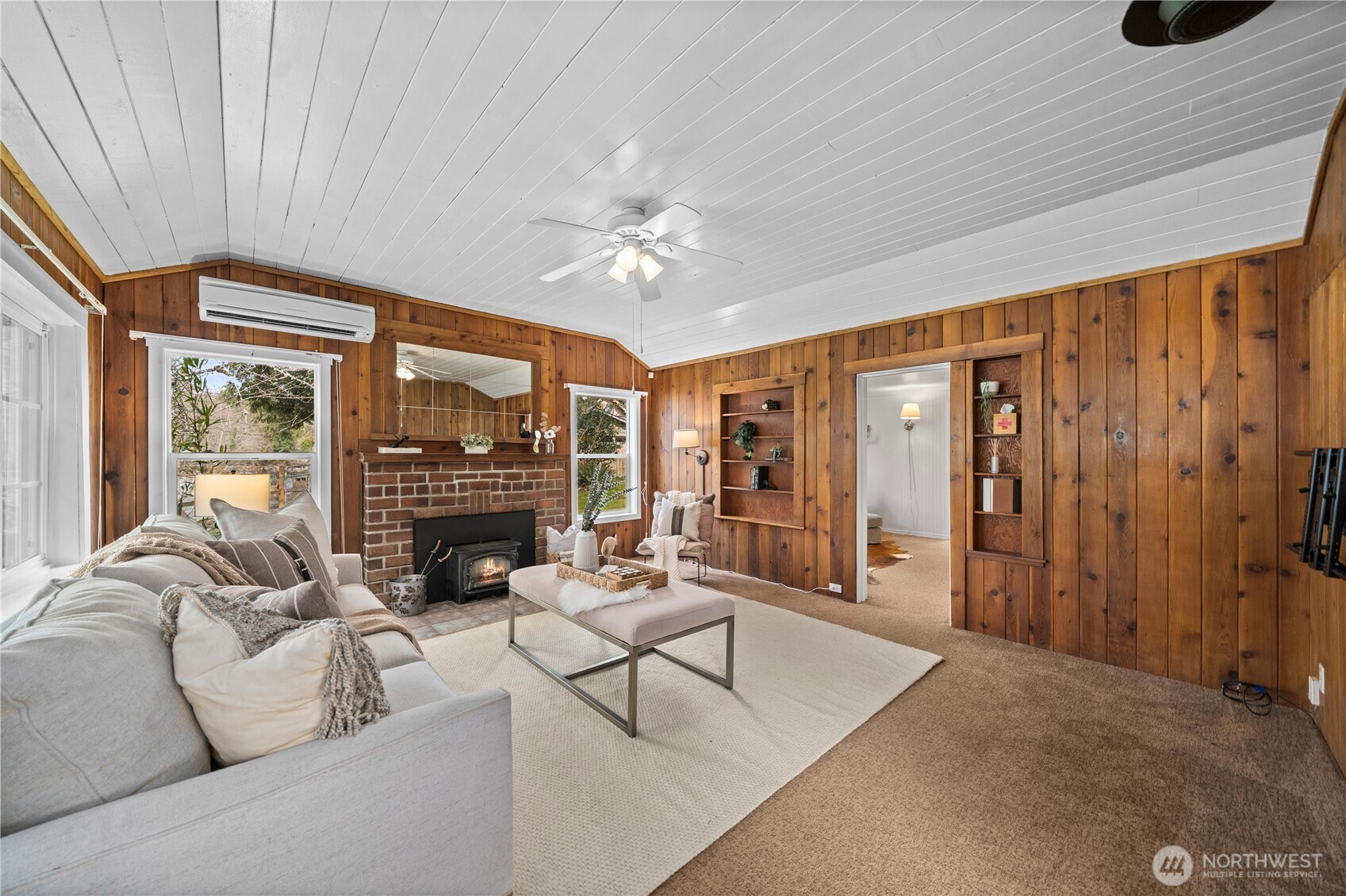 23711 Dorre Don Way Southeast Maple Valley, WA 98038 - Photo 8 of 40 a living room with furniture ceiling fan and a window