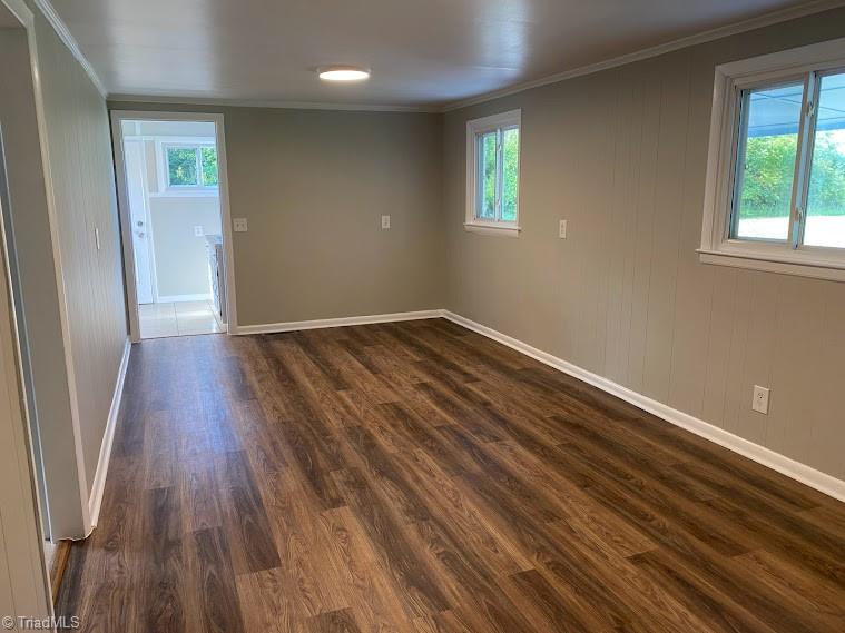7703 Jackson School Road Browns Summit, NC 27214 - Photo 3 of 14 New Laminate Flooring in Living Room