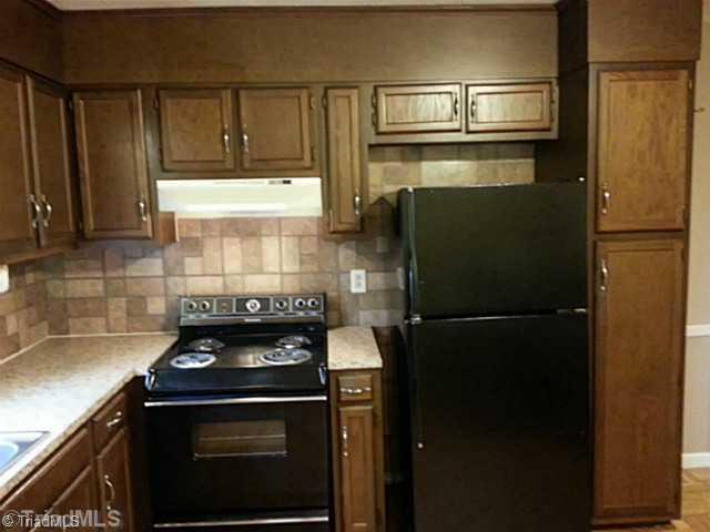 4236 High Point Road Winston-Salem, NC 27107 - Photo 8 of 14 Kitchen. Kitchen with all appliances and PLENTY of storage!!