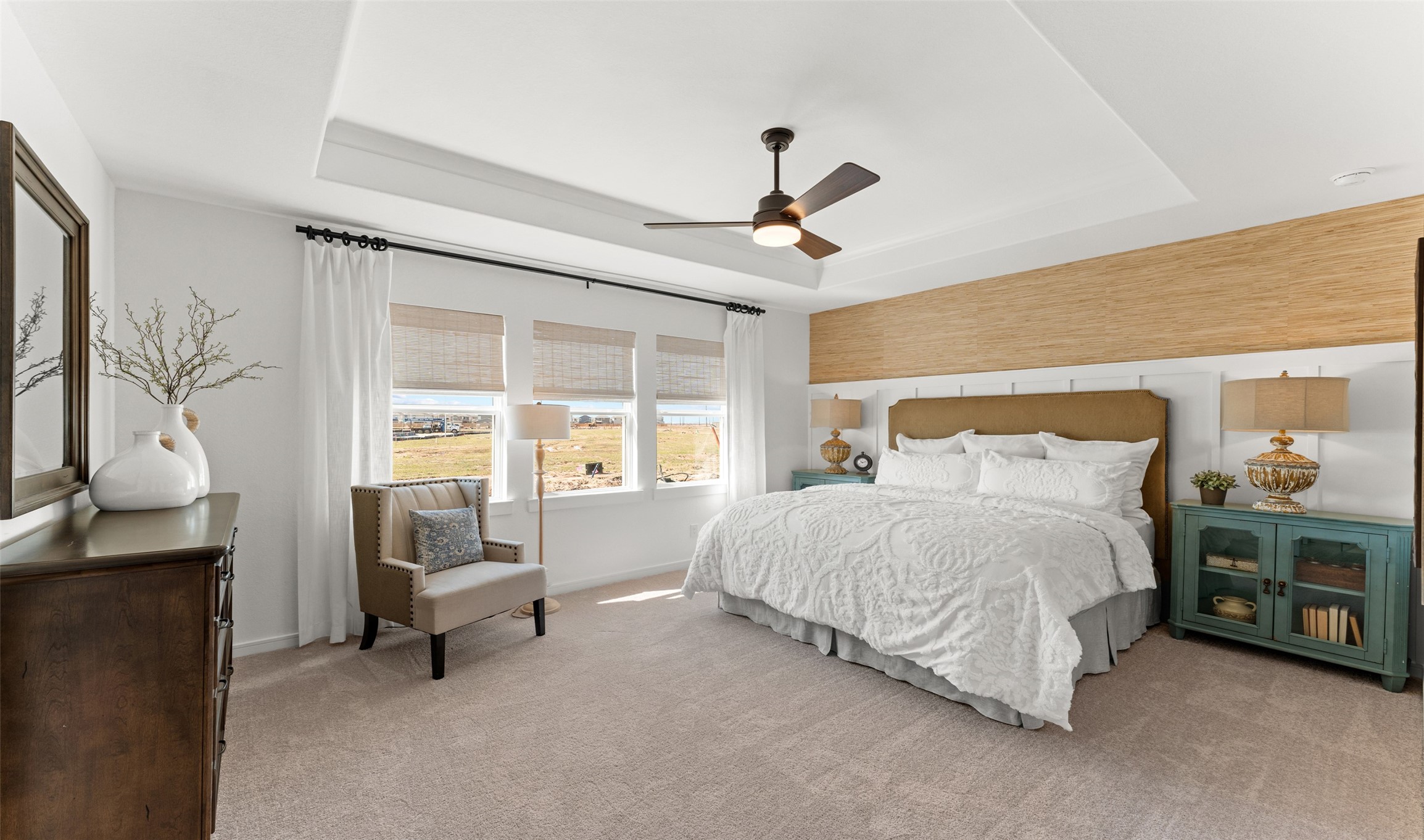 2818 Duchess Drive Rosenberg, TX 77471 - Photo 9 of 30 a bedroom with a bed and a chandelier