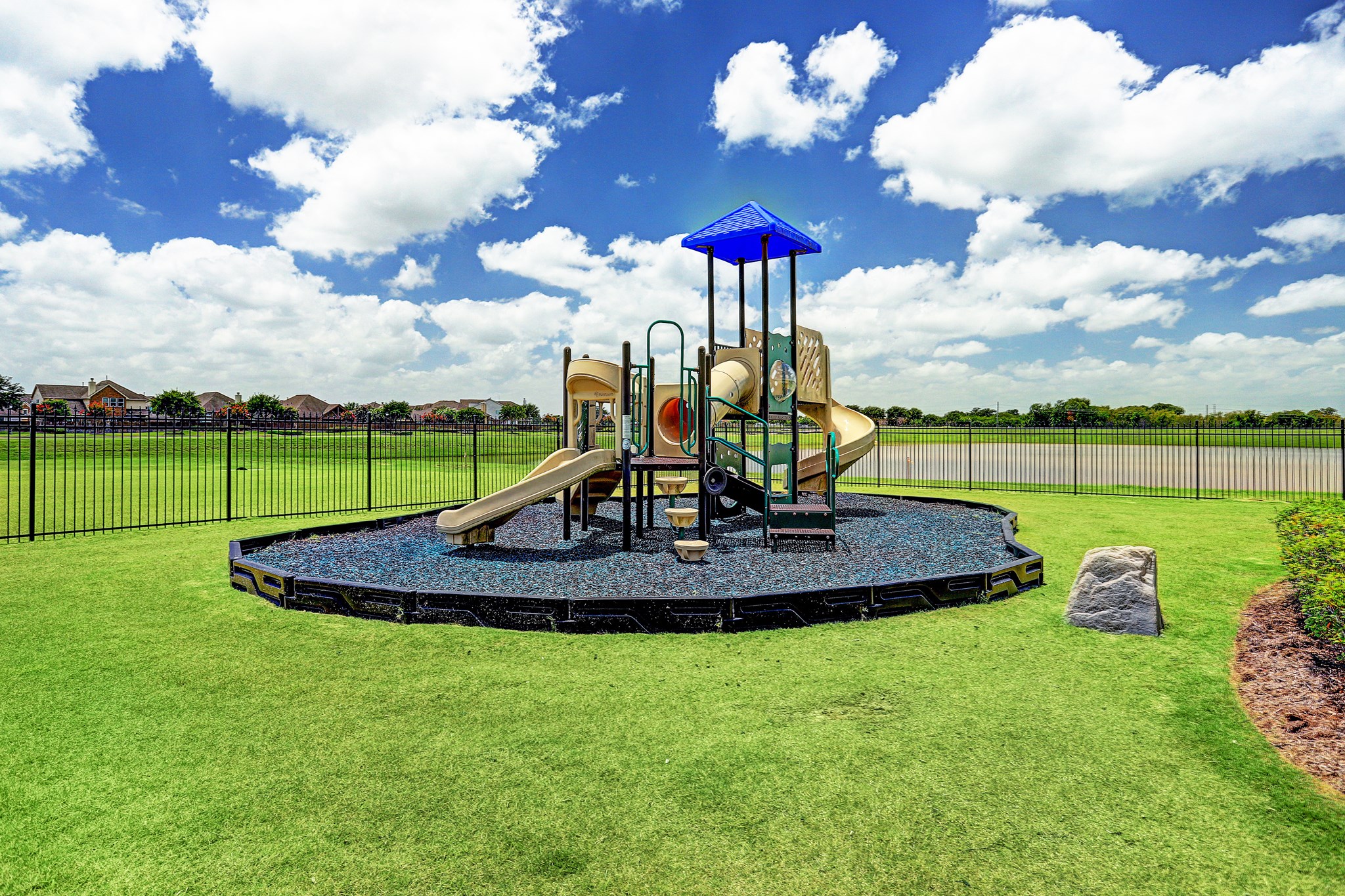 2818 Duchess Drive Rosenberg, TX 77471 - Photo 22 of 30 a view of a house with a big yard and a fountain